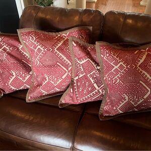 4 Red and Brown Patterned Throw Pillows covers